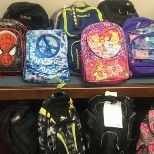 Our employees had fun filling back packs for the Communities That Care Back-to-School program.