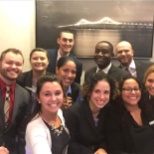 Omni Providence's Front Office takes a team shot with their new Omni selfie stick