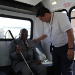 Assisting a visually impaired passenger.