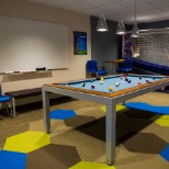 Unwind after a long day of work in one of our game rooms.