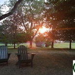 Under the trees at Tripp Lake Camp