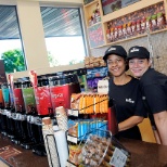 Associates posing for a quick picture at our coffee area