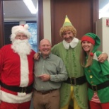 Santa and his elves with our CEO Eddie, who made it on the nice list once again!